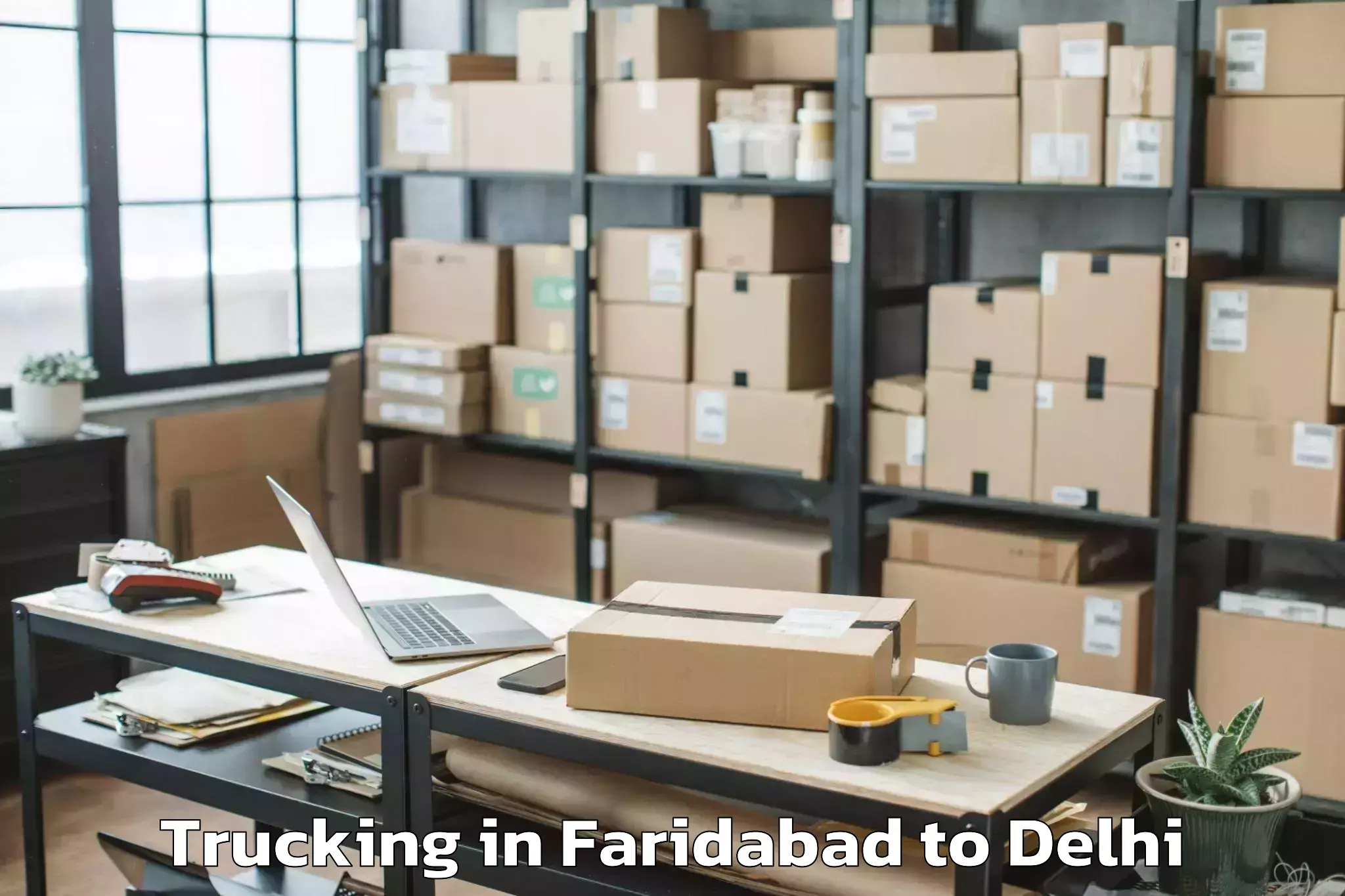 Get Faridabad to Defence Colony Trucking